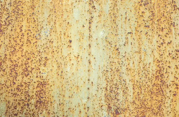 茶色の錆ついた金属の質の背景を割れるペンキの皮 錆びた金属の背景から皮をむく緑のペンキ デザイン要素 ストック写真