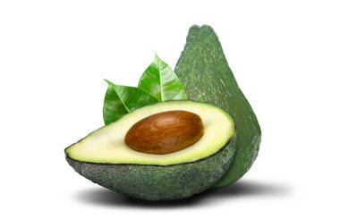 Yerde avokado kesimi, beyaz yapraklı.