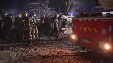 12-storey residential building was destroyed by massive Russian missile attack, work of rescuers and volunteers to clear rubble and search for wounded, Dnipro, Ukraine - 14 Jan 2023. by the evening of