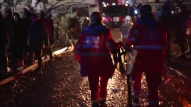 12-storey residential building was destroyed by massive Russian missile attack, work of rescuers and volunteers to clear rubble and search for wounded, Dnipro, Ukraine - 14 Jan 2023. by the evening of