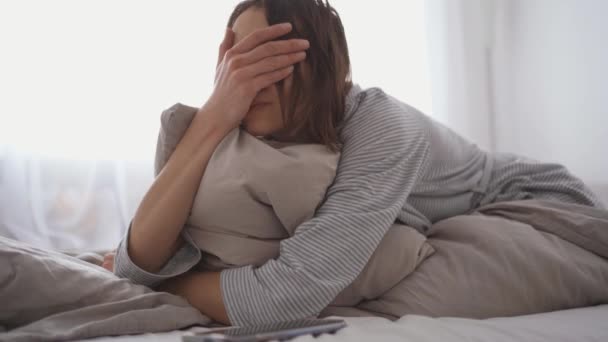 Young Woman Lies Alone Bed Home Cold Sick Illness Cold — Video