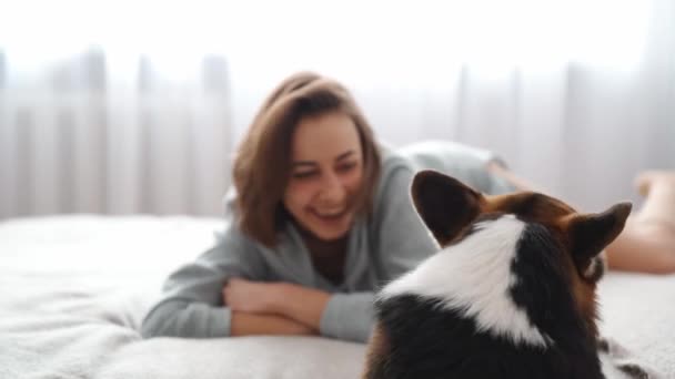 Happy Joyful Smiling Woman Lying Bed Bedroom Playing Her Cute — стоковое видео