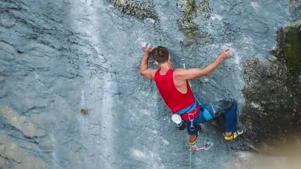 Slow Motion Rock Climber Climbing Rock Man Doing Olympic Sport — Stockvideo