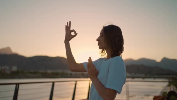 Side Portrait Close Face Woman Practicing Yoga Meditation Sunset Mountain – stockvideo
