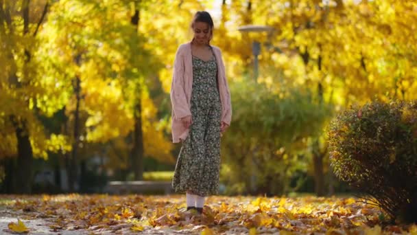 Joyful Smiling Woman Wearing Long Knitted Sweater Cardigan Walks Maple — Stock Video