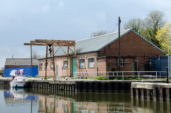 stock image Old warehouses and wharfs on the River Trent, Newark-on-Trent. Dockyard and repair yards on the River Trent