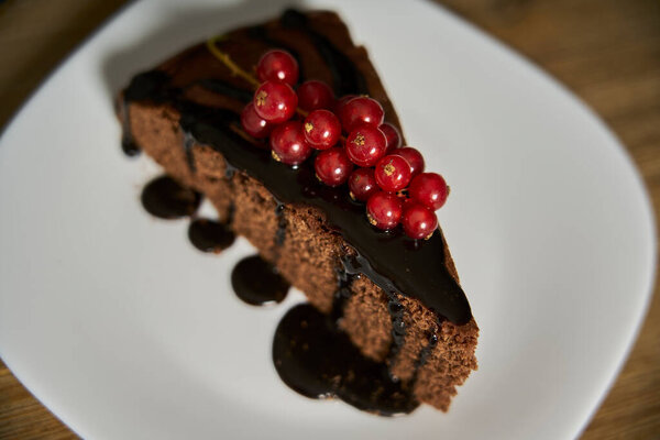Handmade Chocolate Cake Decorated Cranberries Red Currants Wooden Kitchen Table Stock Photo