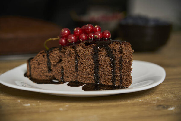 Handmade Chocolate Cake Decorated Cranberries Red Currants Wooden Kitchen Table Royalty Free Stock Images