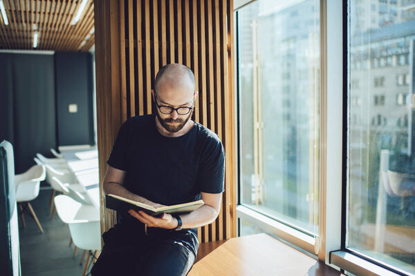 Concentrated Bearded Male Eyeglasses Smart Watch Reading Note Book While Stock Picture