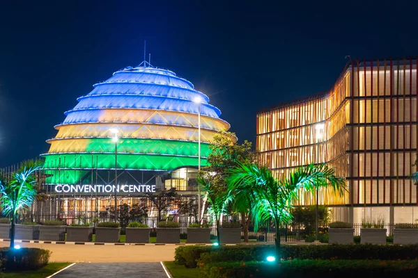 stock image Kigali, Rwanda - August 19 2022: Kigali Convention Centre at night, lit up in the colors of the Rwandan flag. The facility is designed to host a variety of events and is a top attraction in the city.