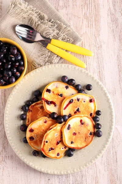 Fresh homemade blueberry pancakes , served
