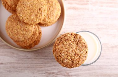 Oat and bran biscuits with glass of milk
