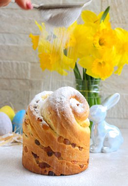 Easter bread, kulich or cruffin with easter decoration