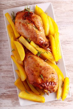 Roast turkey legs with potatoes