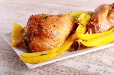 Roast turkey legs with potatoes