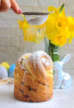 Easter bread, kulich or cruffin with easter decoration