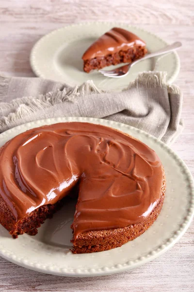 stock image Mocha walnut cake with chocolate ganache topping