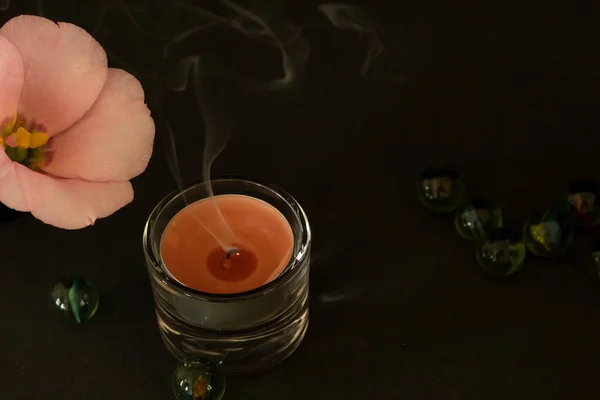 Extinguished Candle Smoke Wax Candle Dark Background Background Pink Flower — Stock Photo, Image
