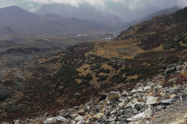falling rock zone and alpine mountain landscape near doklam plateau in east sikkim, india
