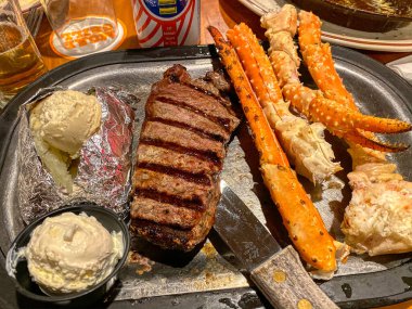 Yummy Steak and Crab Legs - image