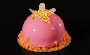 Cake Strawberry with petals on a black background - sweets for children and adults