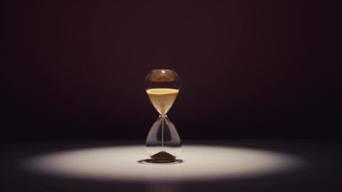 İzole edilmiş siyah arkaplanı olan kum saatleri.
