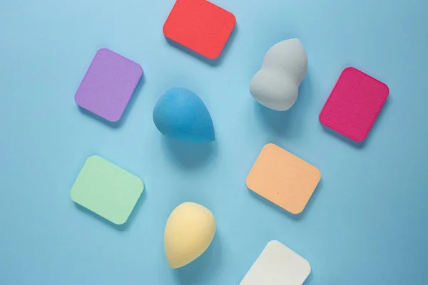 stock image Top view of different cosmetics sponges,all types and forms.Good as cosmetic background.