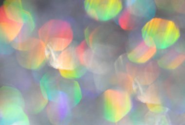 Parlayan ışıltıyla odaklanmış soyut holografik arkaplan. Katman kadar iyi..