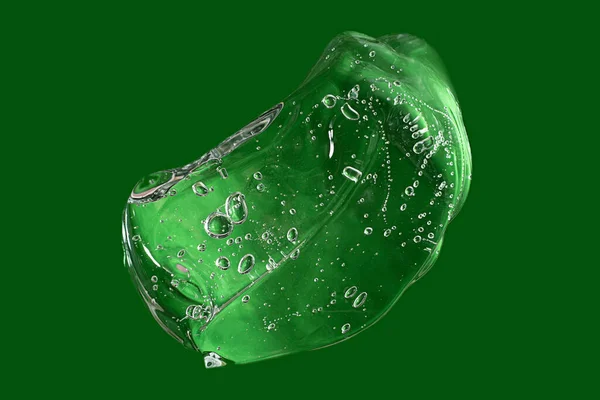 緑の背景にゼリー化粧品ゲルのマクロ写真 — ストック写真