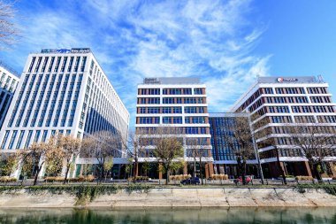 Bucharest, Romania, 20 Nov 2021: Modern glass business buildings at Timpuri Noi area with headquarters of Platika, Tremend, Zitec in a sunny autumn day 