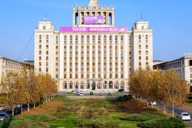 Bucharest, Romania - 6 November 2021: The main building of the House of the Free Press panorama (Casa Presei Libere) in the style of Soviet Socialist realism in the city center in a sunny autumn day