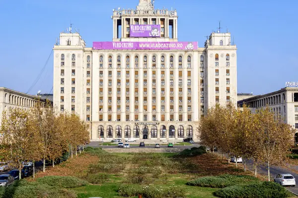 stock image Bucharest, Romania - 6 November 2021: The main building of the House of the Free Press panorama (Casa Presei Libere) in the style of Soviet Socialist realism in the city center in a sunny autumn day