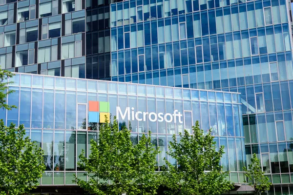 stock image Bucharest, Romania - 15 May 2021: Microsoft headquarter and offices in City Gate Towers in the Northern part of the city in a sunny spring day