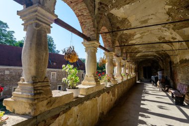 Old building in the renovation process at Cris Bethlen Castle in Mures county, in Transylvania (Transilvania) region, Romania in summer clipart