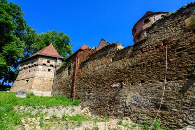 Old building in the renovation process at Cris Bethlen Castle in Mures county, in Transylvania (Transilvania) region, Romania in summer clipart