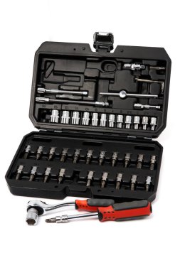 Repair kit in plastic case on white background, vertical shot.