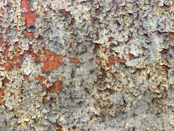 Metal yüzeydeki pas ve soyulmuş boya dokusu. Soyut endüstriyel arkaplan, tasarım projeleri, posterler ve grafik örtüleri için mükemmel.