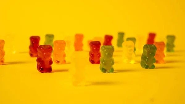 Jelly bears gang. Bright gummy bears group. Colorful sugar candy. Sweet addiction. Teddy jelly bear.