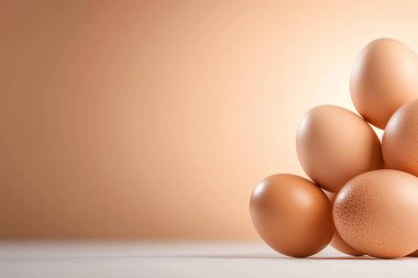 A stack of brown eggs on a neutral background, showcasing simplicity and elegance. Perfect for concepts related to food and nature. clipart