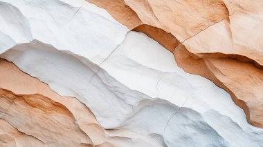 Layered sandstone with white and orange hues clipart