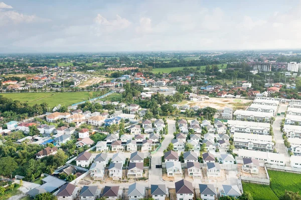 Housing estate, village or community consist of residential building in land lot. Real estate or property from construction for resident, agent, realtor and investor to sale, rent, buy in Chiang Mai.
