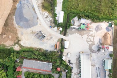 Concrete plant or batching plant in top view. Building and equipment for production ready mix concrete by mix aggregate material i.e. cement, water, sand, rock or gravel for construction work.