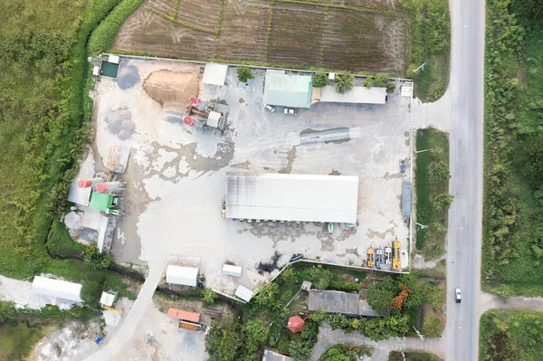 Concrete plant or batching plant in top view. Building and equipment for production ready mix concrete by mix aggregate material i.e. cement, water, sand, rock or gravel for construction work.