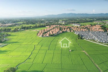 Land or landscape of green field in aerial view. Include agriculture farm, icon of home, house or residential building. Real estate or property for dream concept to build, construction, sale and buy. clipart