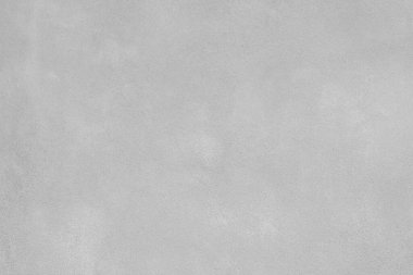 Beton duvar sıvası, iç bina için çimento karışımı, kum veya inşaat malzemesi desenlerinden oluşur. Düz pürüzsüz, gri renkli. Boş, boş ve arka planda kimse yok.
