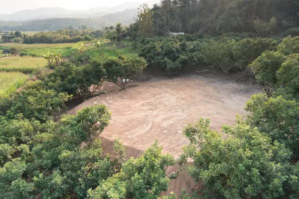 stock image Land and soil backfill in aerial view. Include landscape, empty or vacant area at outdoor. Real estate or property for small plot, sale, rent, buy, purchase, mortgage and investment in Nan, Thailand.