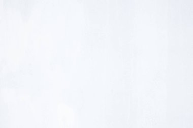 Beton duvardaki kaygan ceketin dokusu pürüzsüz olsun diye. Tamir için beyaz bileşik harç malzemesi yapıştırmak ya da uygulamak için inşaat işi, inşaatçı profesyonelin geliştirmesi.