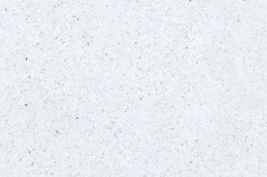 Terrazzo yüzeyinin kusursuz dokusu. Betonla karıştırılmış küçük çakıllar. Yumuşatmak için öğütüyorum. Dekorasyon için beyaz parlak yansıma yüzeyi zemin duvarının dış görünüşü arka plan için..