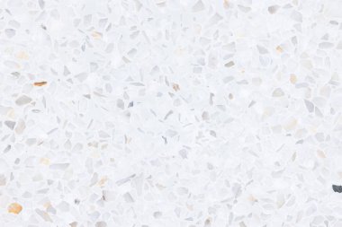 Terrazzo zemini en üstte. Kusursuz doku, baştan sona tutarlı. Yeni, temiz, parlak ve düzenli olarak. Havan harcı ile karıştırılmış küçük gri çakıl. Döşeme, duvar ya da kaplama için pürüzsüz cilalanmış.