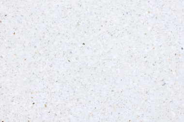 Terrazzo 'nun zemini pürüzsüz. Parlak parlak beyaz bir görünüm. Betonla karıştırılmış mermer çakıl. İç dekorasyon için pürüzsüz bir yüzey, mimari tasarım. Arkaplan için uygun.